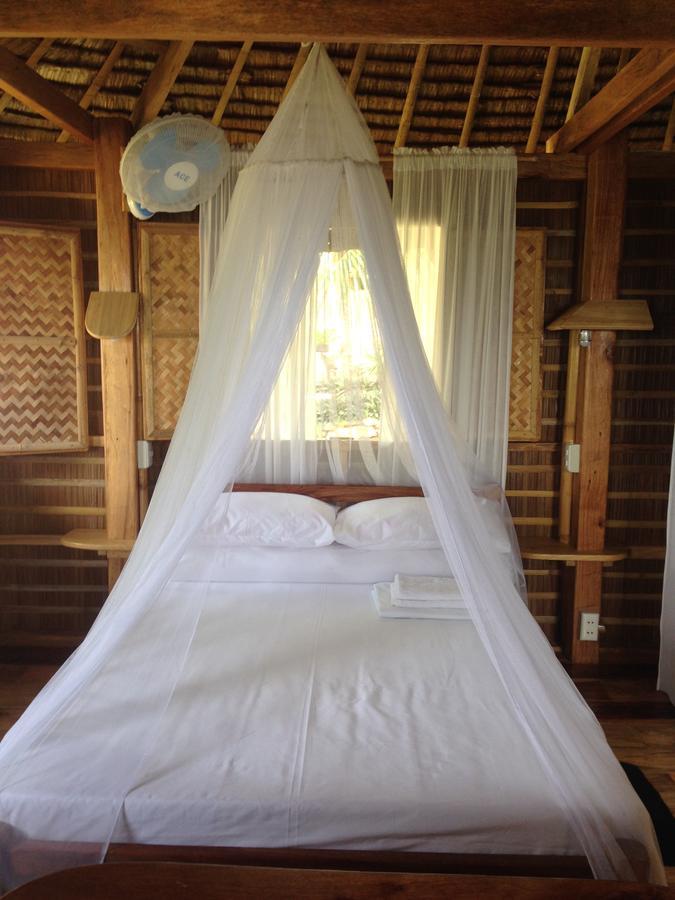 Tinaoog Beach Resort Alad Rum bild